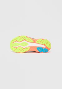 Running shoe outsole with bright green and orange rubber. Features patterned grooves and blue accents for traction and grip.
