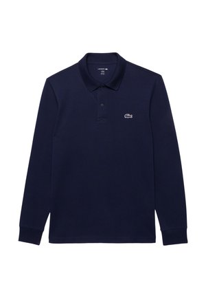 Polo de manga larga en color marino, fabricado en algodón; cuenta con un cuello clásico y un pequeño logo blanco de Lacoste en el lado izquierdo del pecho.