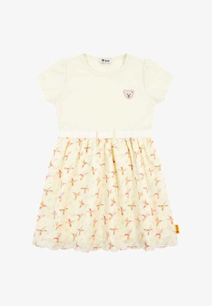 Abito a maniche corte con parte superiore crema e gonna di un leggero giallo a fantasia floreale; presenta un'appliqué a forma di orso sul petto e un orlo scallop.