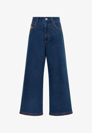 Jeans in denim a gamba larga di colore blu scuro con cuciture arancioni, design con cinque tasche e chiusura con bottone in vita. Tessuto pesante.