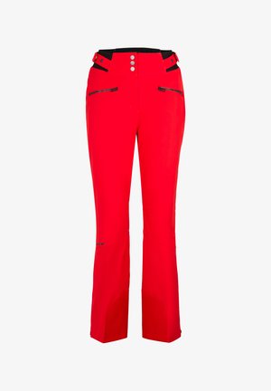 Red ski pants made of durable material, featuring a fitted waist, multiple zippered pockets, and a straight leg design. Black accents on pockets.