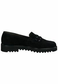 Mocasines de ante negro con una suela de goma plana y texturizada. Presentan detalles decorativos en la parte superior y un diseño de punta redondeada.
