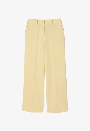 Pantalon large jaune clair avec pli frontal, passants de ceinture, poches latérales et fermeture frontale dissimulée.