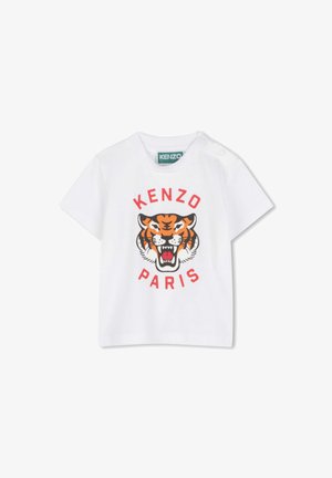T-shirt bianco in cotone con una grafica colorata di una tigre e testo "KENZO" e "PARIS" in rosso. Progettato con collo rotondo e bottoni a pressione.