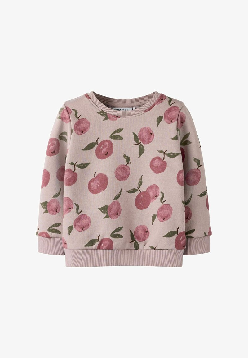 Felpa rosa chiaro con un motivo ripetuto di ciliegie in stile acquerello e foglie verdi. Collo e polsini a coste. Tessuto in misto cotone.