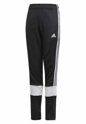 Pantalons de sport noirs avec taille élastique, rayures blanches sur les côtés et accents blancs sur le bas des jambes. Fabriqués en tissu lisse et léger.
