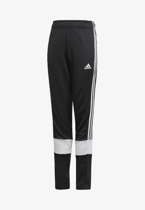 Pantalons de sport noirs avec taille élastique, rayures blanches sur les côtés et accents blancs sur le bas des jambes. Fabriqués en tissu lisse et léger.