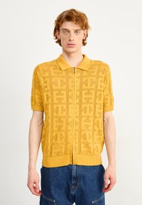 HUF MONOGRAM ZIP UNISEX - Vesta na kopčanje - dijon