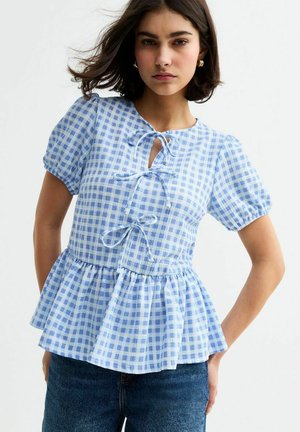 Blue and white checked blouse with short puff sleeves, a keyhole neckline, and a peplum hemline, made from lightweight fabric.