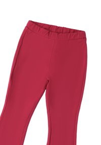 Leggings aderenti con vita elasticizzata di un vivace colore rosa. Texture liscia con cuciture laterali e un design confortevole.