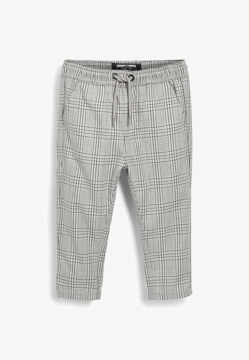 Pantalon à carreaux gris et blanc avec taille élastique et cordon de serrage, doté de poches latérales, présenté à plat sur fond blanc.