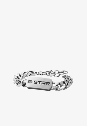 Sølv metal kæde armbånd med en rektangulær plade graveret med "G-STAR" og lukning med hummerlås.