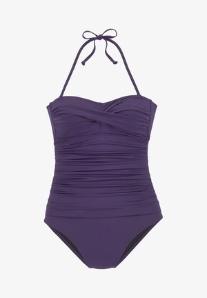 Maillot de bain une pièce violet avec un design plissé et texturé, doté d'une attache derrière le cou. Présente une doublure noire contrastante au niveau des jambes.