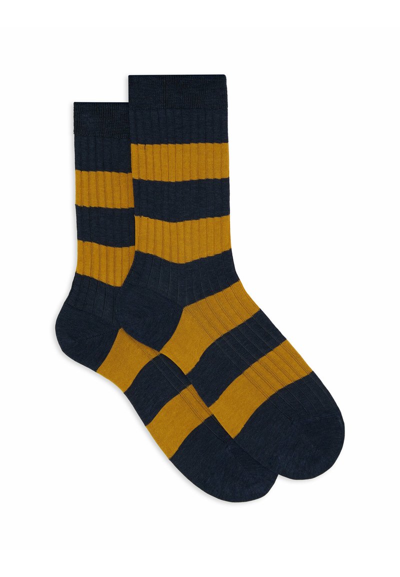 Calze a righe con colori blu navy e giallo senape, texture a coste e design classico con strisce orizzontali a contrasto.