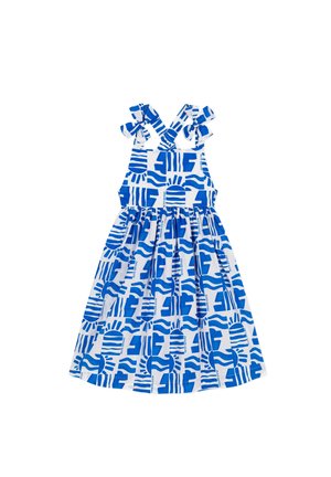 Biała sukienka bez rękawów z niebieskimi abstrakcyjnymi wzorami słońca i fal, związywanymi ramiączkami na ramionach oraz marszczonym dołem.