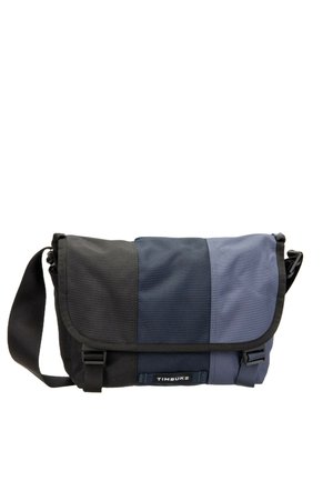 Rectangular messenger bag with three vertical color panels in black, navy, and dark blue, featuring a wide adjustable shoulder strap.