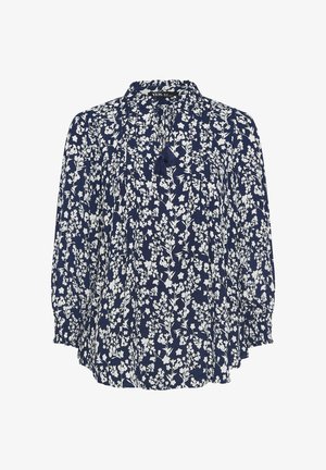 Camicia a maniche lunghe blu navy con stampa floreale bianca, scollo rotondo e dettagli con nappine e laccetti sul davanti.