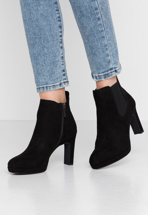 Højhælede støvletter - black