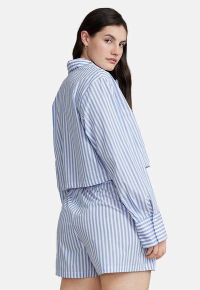 Blue and white striped cropped button-up shirt and matching shorts, featuring a relaxed fit, long sleeves, and smooth cotton texture.