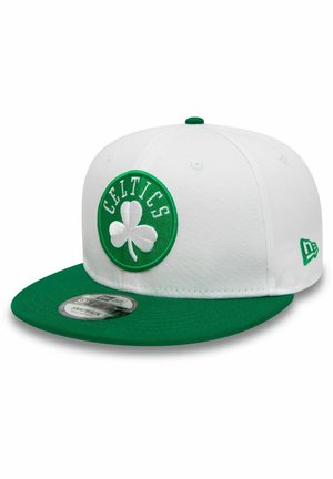 White cap with a green visor, featuring an embroidered green and white "Celtics" logo with a shamrock. Snapback design.