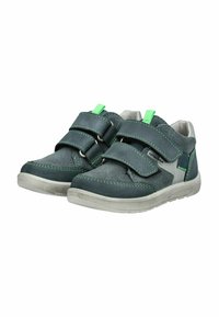 Tmavě zelené dětské tenisky s dvojitými suchými zipy, světle zeleným prošitím, bílými podrážkami a zelenými poutky na patě a jazyku.