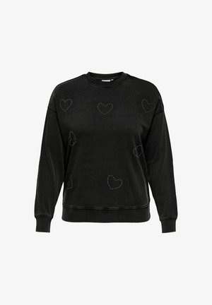 Svart sweatshirt i mjukt material, med silverfärgade nitar i form av hjärtan utspridda över framsidan. Rundhals och ribbade ärmmuddar.