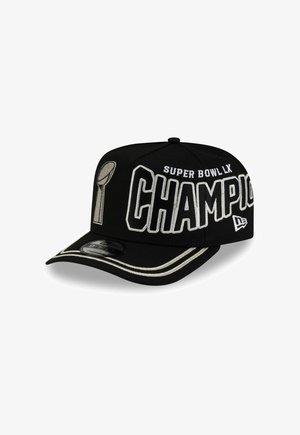 Black baseball cap with "Super Bowl LX Champions" text, Lombardi trophy graphic, and white trim on the brim, angled slightly to the right.