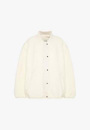 White, fluffy bomber jacket with a ribbed collar, snap button front, and side pockets. Soft texture with a relaxed fit design.