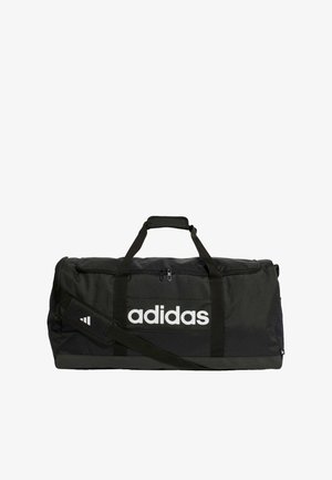 Svart duffelväska tillverkad av hållbart tyg. Har en vit Adidas-logotyp, dubbla handtag, justerbar axelrem och ett dragkedjan huvudfack.