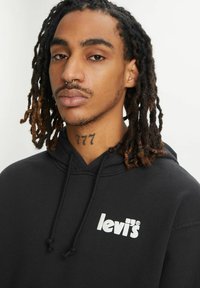 Levi's® RELAXED GRAPHIC - Felpa con cappuccio - white