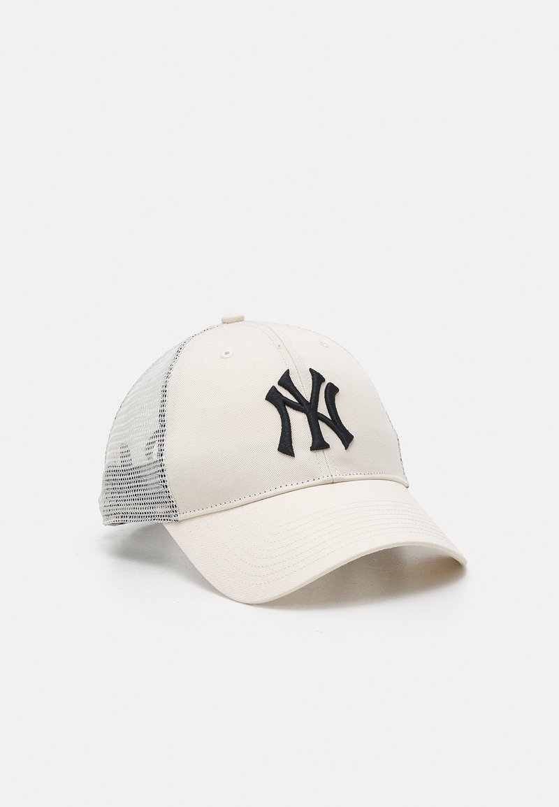 Beige Baseballcap mit einem schwarzen, gestickten "NY"-Logo auf der Vorderseite, ausgestattet mit einem Netzrücken und einem gebogenen Schirm, der für Belüftung sorgt.
