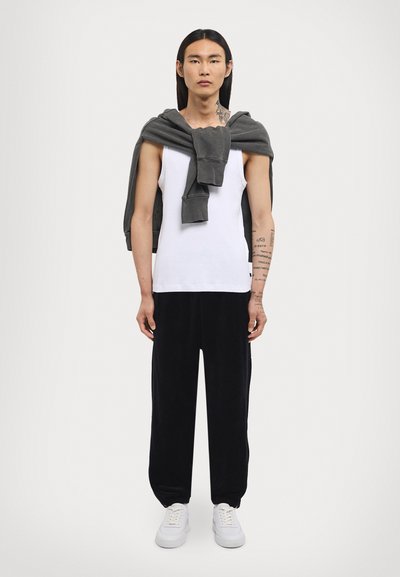 Noon Goons DIAL TRACKPANT - Tracksuit bottoms - black