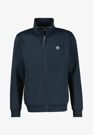 Marineblå fuld lynlåsjakke med høj krave, ribstrikkede manchetter og kant, sidelommer og lille logopatch på venstre bryst.