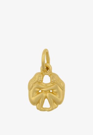 Pendentif en or montrant deux femmes assises aux longs cheveux face à face, les bras croisés et entrelacés dans un design symétrique.