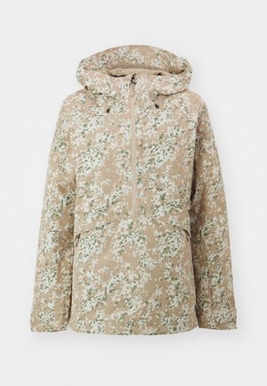 Veste pull beige avec un motif camouflage floral, dotée d'une capuche, d'une fermeture éclair sur le devant et d'une coupe décontractée. Tissu lisse et résistant à l'eau.