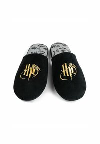 Black suede slippers featuring a gold embroidered logo. The interior has a patterned gray lining with various symbols. Comfortable slip-on design.