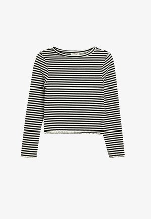 Top a maniche lunghe a righe bianche e nere, design cropped, texture a coste, scollatura rotonda e orlo sfilacciato. Presenta una silhouette aderente.