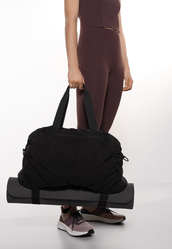 RUCHED - Reisetasche