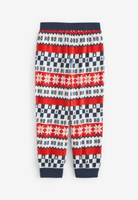 Röd, vit och marinblå pyjamasbyxor med semesterdesign, inklusive texten "HO", snöflingor och träd. Resårmidja och avslutade anklar.