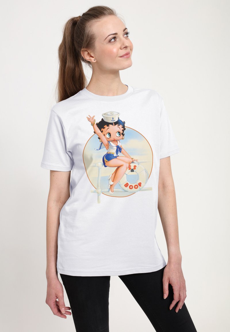 Weißes Baumwoll-T-Shirt mit einem bunten Grafikdruck eines Cartoon-Charakters im Matrosen-Outfit, der mit einem Rettungsring in einer verspielten Pose dargestellt ist.