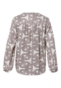 Blouse met lange mouwen in crème kleur met een paarse geometrische print, voorzien van elastische manchetten en een geplooide achterkant voor bewegingsvrijheid.