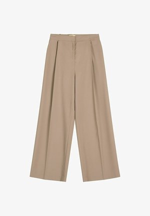 Beżowe spodnie o szerokich nogawkach z wysokim stanem, przednimi fałdami i ukrytym zamkiem błyskawicznym, rozłożone na płasko na białym tle.