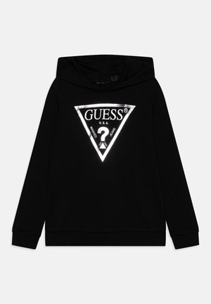 Sweatshirt preto feito de tecido macio, apresentando um grande gráfico triangular refletor com o texto "GUESS U.S.A." e um ponto de interrogação.