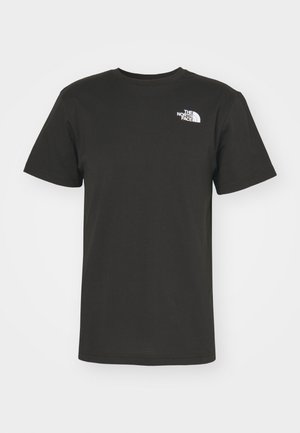 T-shirt in cotone nero con collo rotondo, maniche corte e un piccolo logo bianco sul lato sinistro del petto. Design semplice, texture liscia.