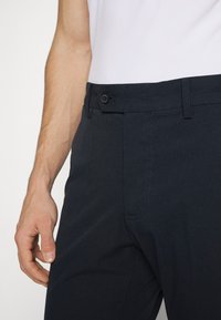 J.LINDEBERG Sports VENT GOLF PANT - Calças - navy
