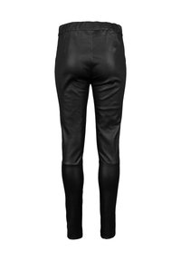 Zwarte leren leggings met een aansluitend ontwerp en een elastische tailleband. Gladde textuur, geen zichtbare naden of accenten. Achteraanzicht weergegeven.
