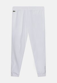 Lacoste - SPORTS JOGGERS - Verryttelyhousut - white Pienoiskuva 1