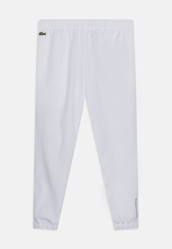 SPORTS JOGGERS - Tracksuit bottoms