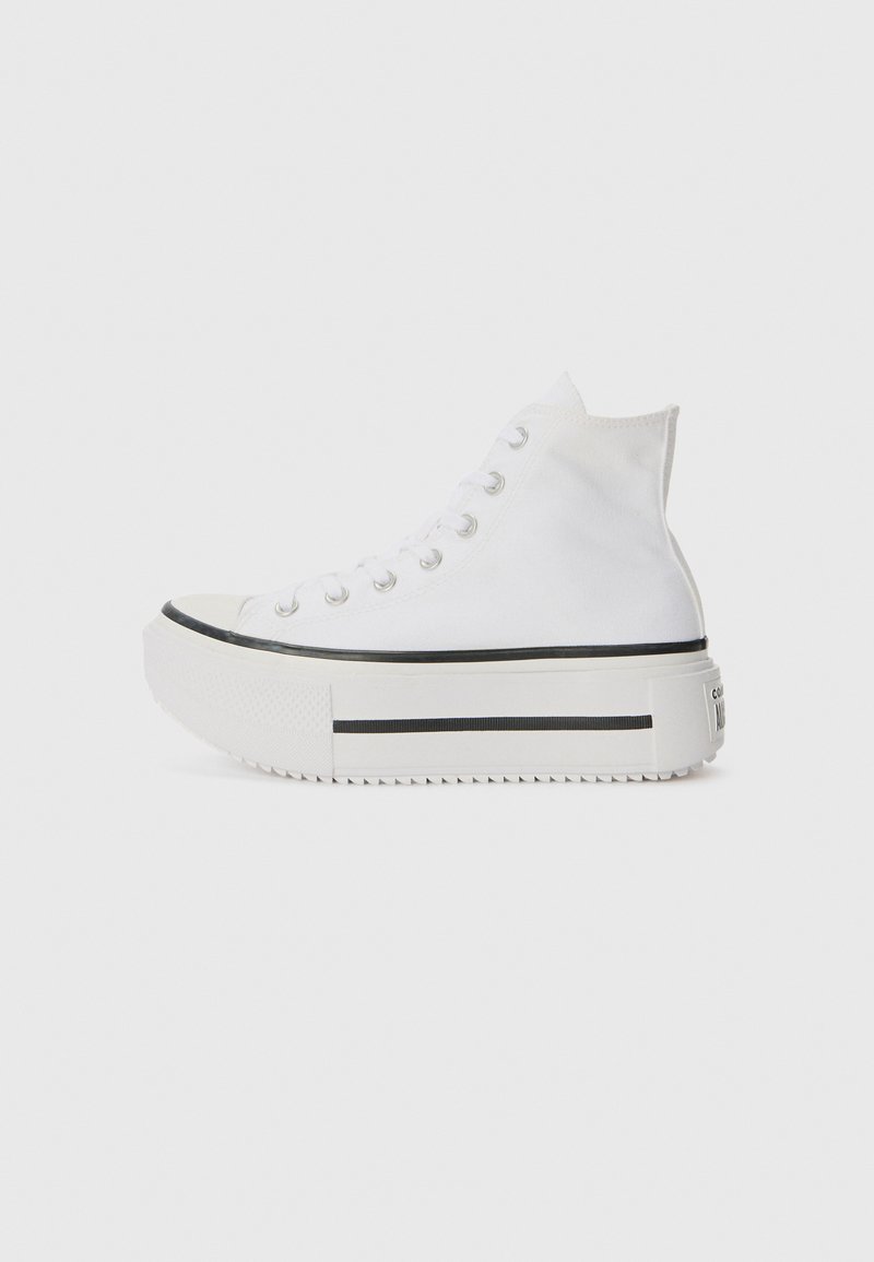 White high-top sneakers with a canvas upper, rubber sole, black stripe detail, and lace-up closure. Textured sole for added grip.