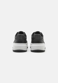 Calvin Klein Jeans DAISY UNISEX - Sneakers basse - black